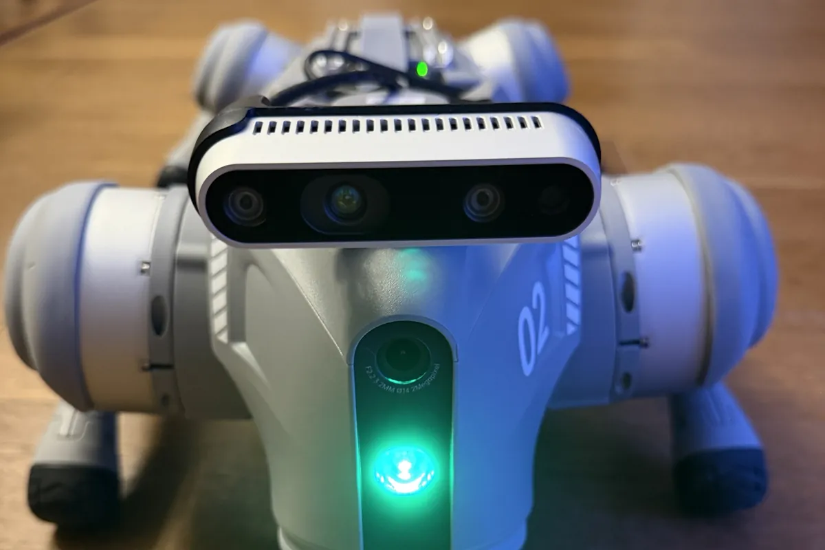 A real photo of our robot's front cameras, up close, with its front light on