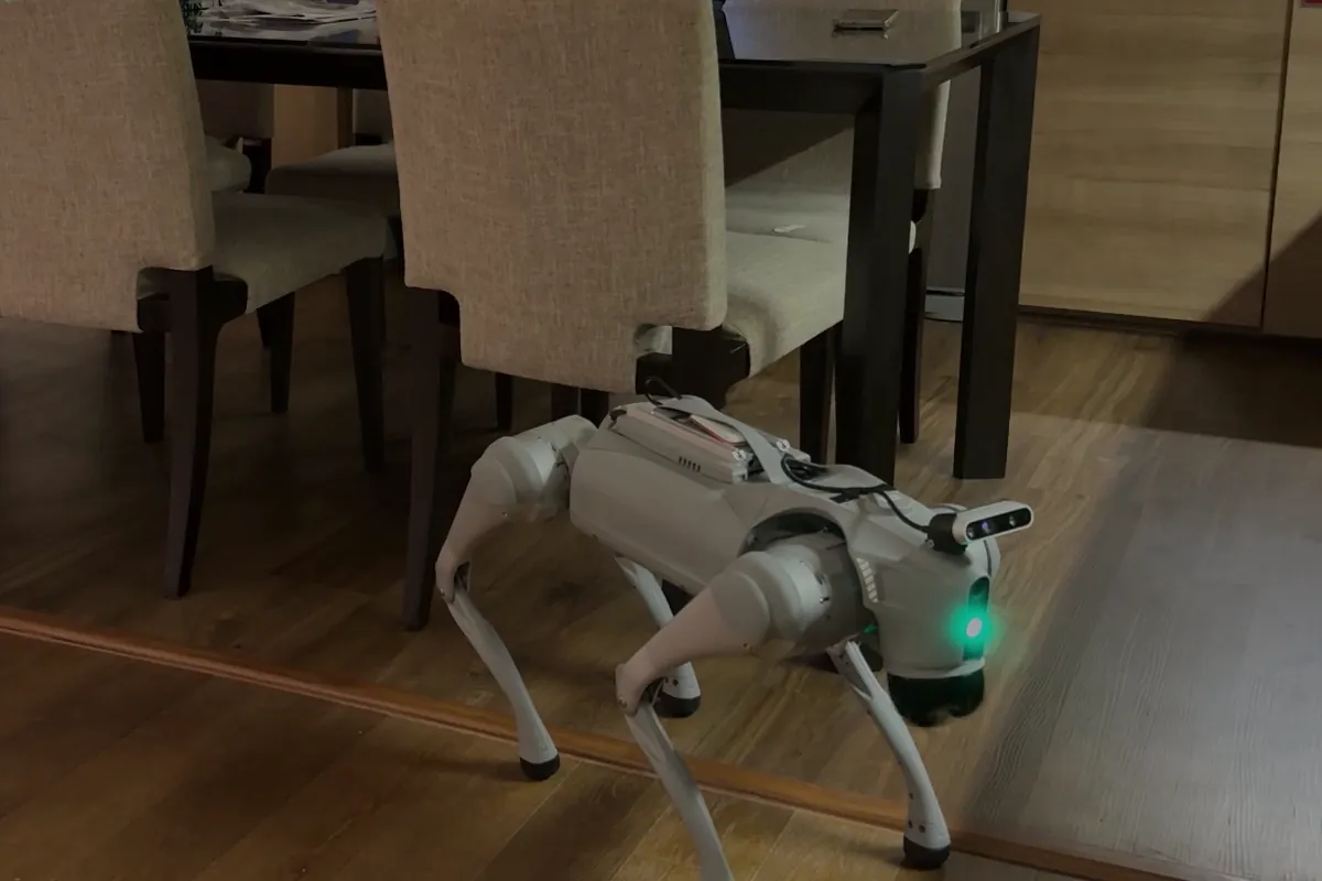 Real footage: our robot standing by a dining table, where it was just told the name of the place
